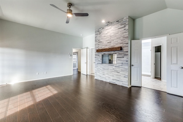 unfurnished living room with hardwood / wood-style flooring, ceiling fan, and lofted ceiling