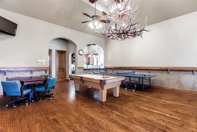 recreation room with hardwood / wood-style flooring, ceiling fan with notable chandelier, pool table, and lofted ceiling