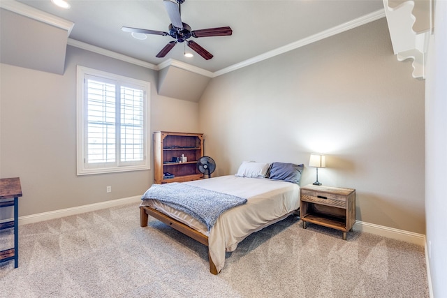 carpeted bedroom with crown molding and ceiling fan