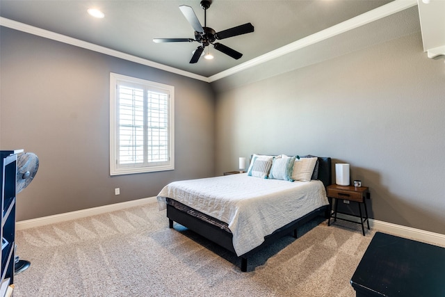 bedroom featuring crown molding, ceiling fan, and carpet