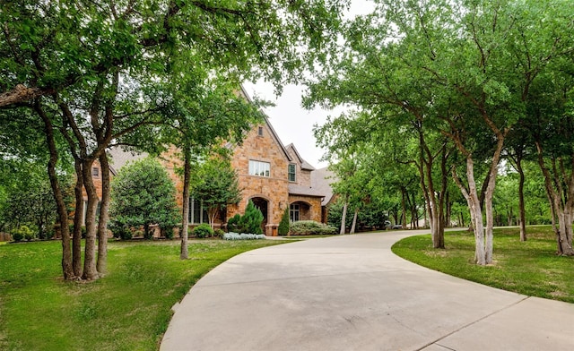 view of front of home with a front lawn