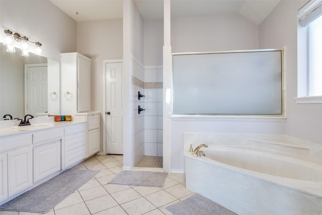 bathroom with lofted ceiling, vanity, tile patterned floors, and independent shower and bath