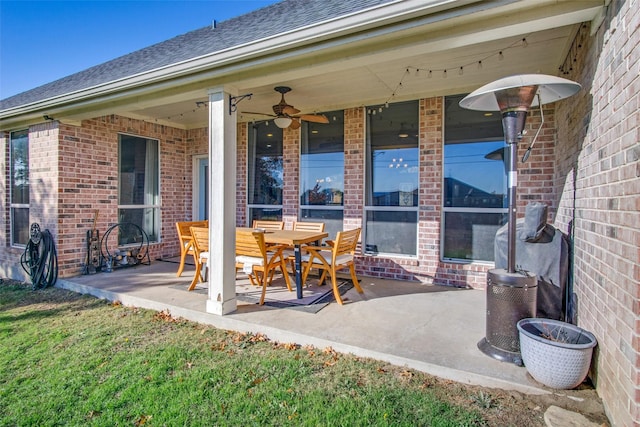 view of patio / terrace featuring ceiling fan