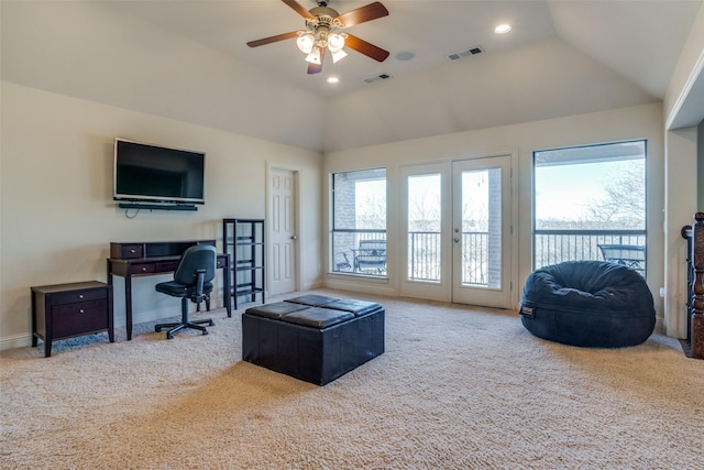 interior space with french doors, ceiling fan, lofted ceiling, and a wealth of natural light