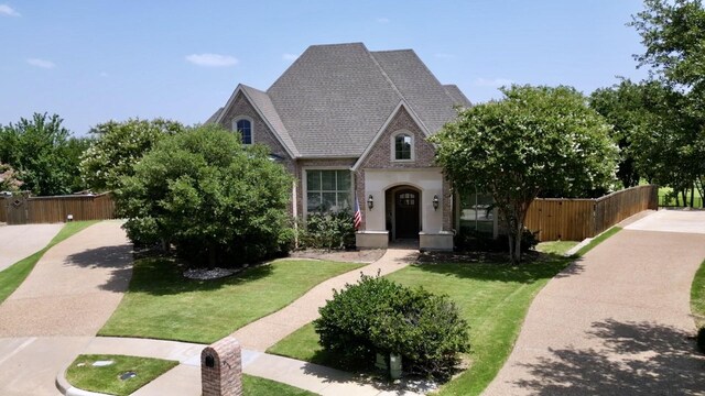 view of front of property with a front lawn