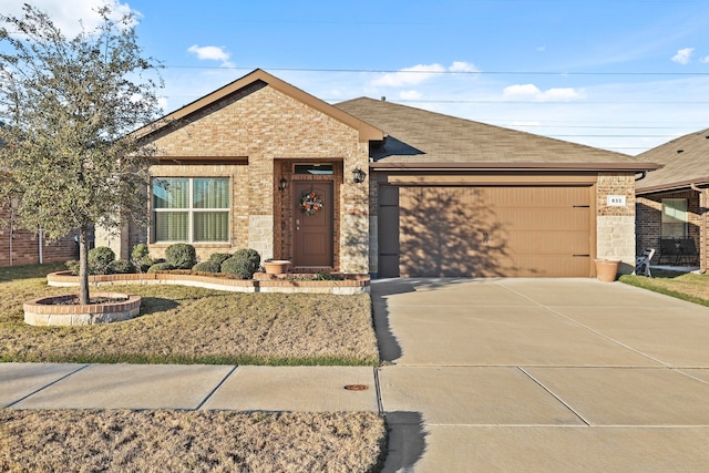 single story home featuring a garage