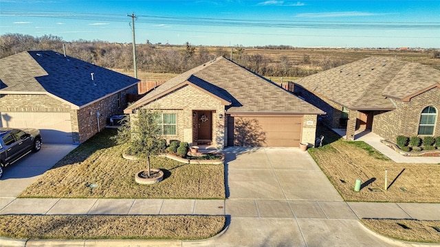 ranch-style house featuring a garage