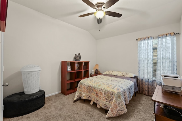 carpeted bedroom featuring ceiling fan and lofted ceiling