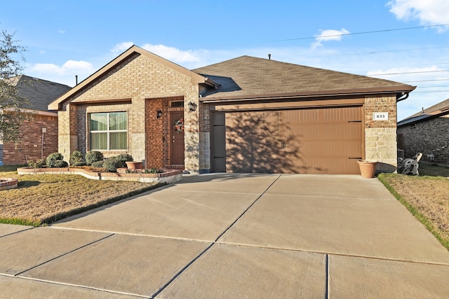 ranch-style house featuring a garage