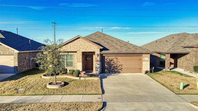 ranch-style home with a garage and a front lawn