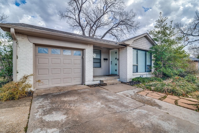 single story home with a garage