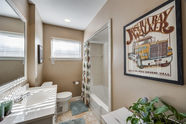 full bathroom featuring toilet, a textured ceiling, vanity, shower / bath combo, and tile patterned flooring