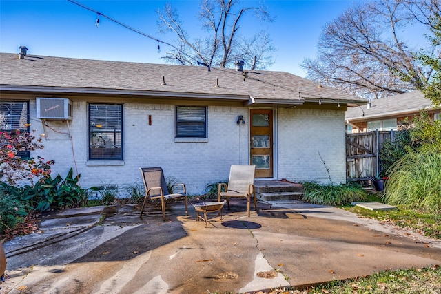 rear view of house featuring a patio