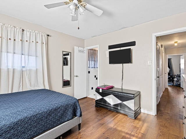 bedroom featuring dark hardwood / wood-style floors and ceiling fan