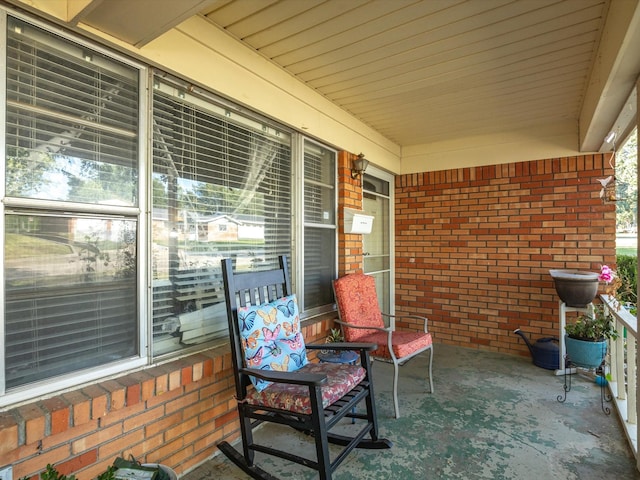 view of patio featuring a porch