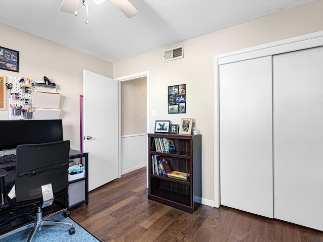 office area with ceiling fan and dark hardwood / wood-style floors