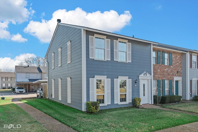 view of front of property with a front yard