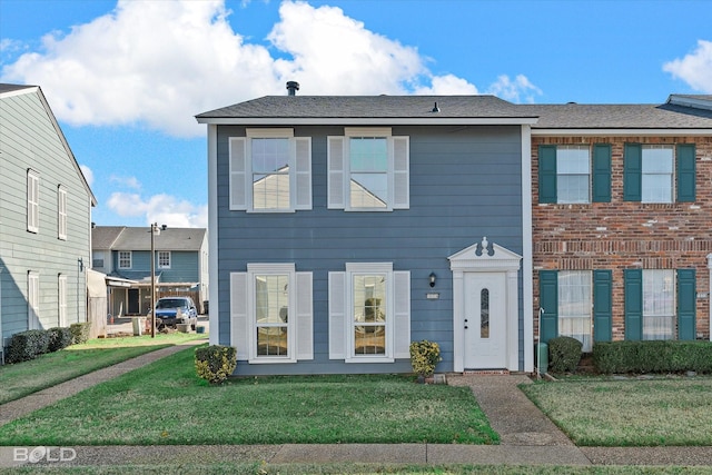 view of front of property with a front yard