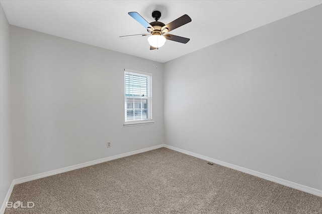 unfurnished room featuring carpet flooring and ceiling fan