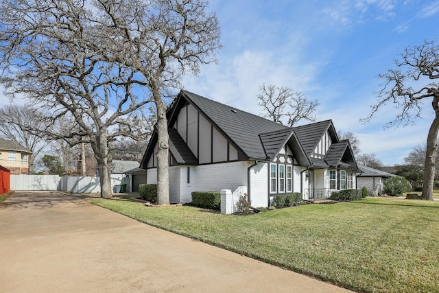 view of property exterior featuring a lawn