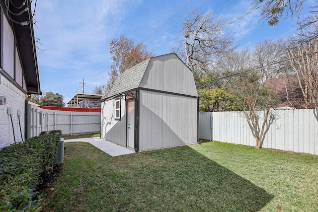 view of outdoor structure featuring a lawn