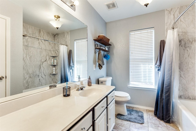 full bathroom featuring tile patterned flooring, vanity, toilet, and shower / bath combo with shower curtain