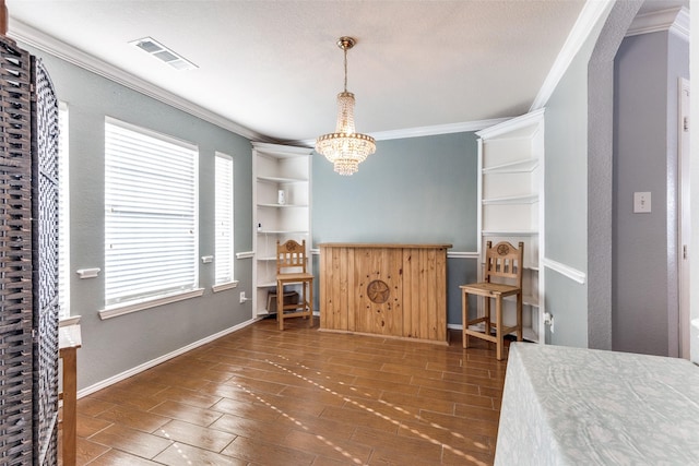 bedroom with a chandelier and ornamental molding