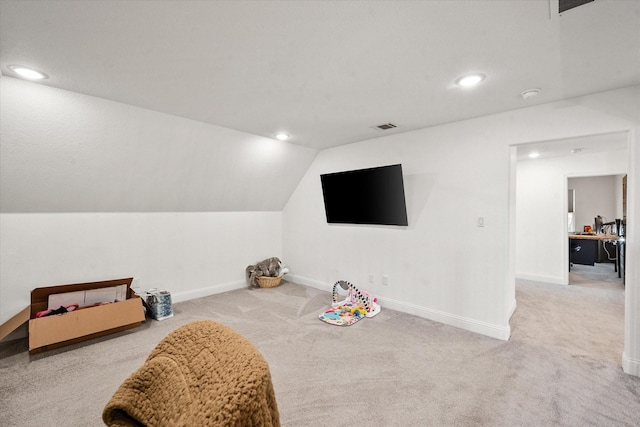 playroom featuring recessed lighting, light colored carpet, visible vents, baseboards, and vaulted ceiling