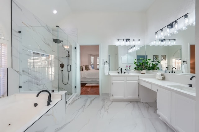 bathroom with vanity, vaulted ceiling, and plus walk in shower