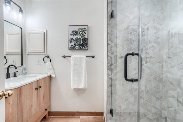 bathroom featuring vanity and walk in shower