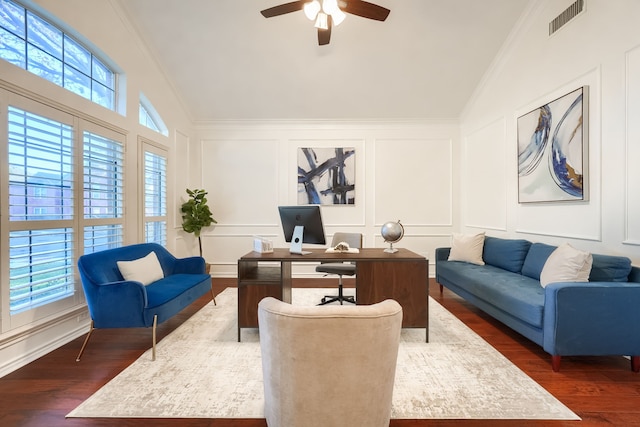 office featuring a healthy amount of sunlight, vaulted ceiling, and dark wood-type flooring