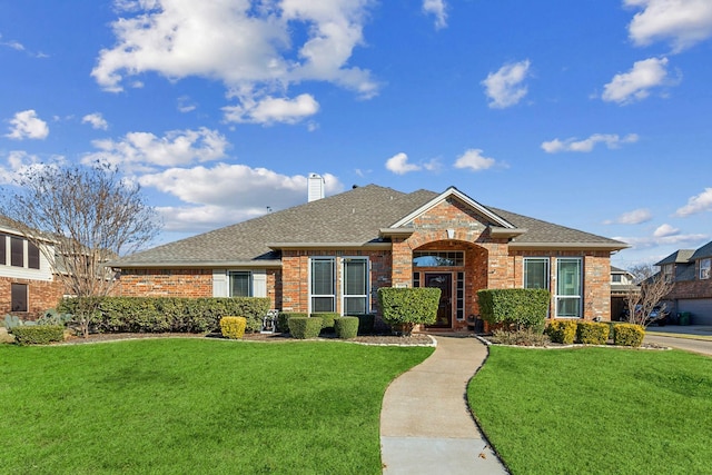 ranch-style house with a front yard