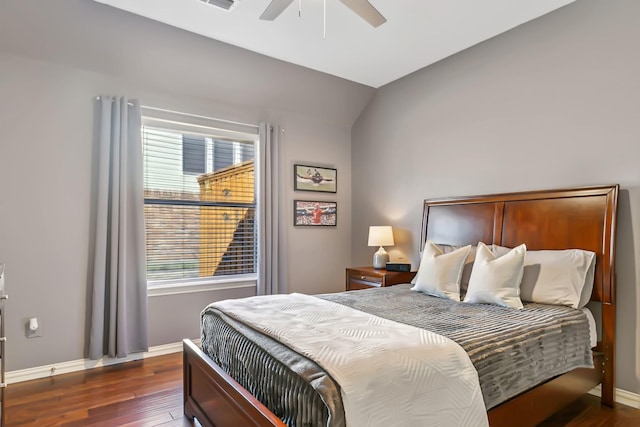 bedroom featuring ceiling fan and dark hardwood / wood-style floors