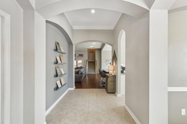 corridor with light tile patterned flooring