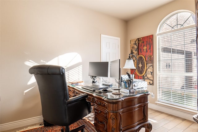 office space with light hardwood / wood-style flooring