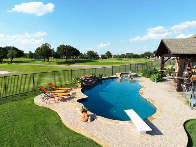 view of pool with a gazebo, a yard, a diving board, and a patio area