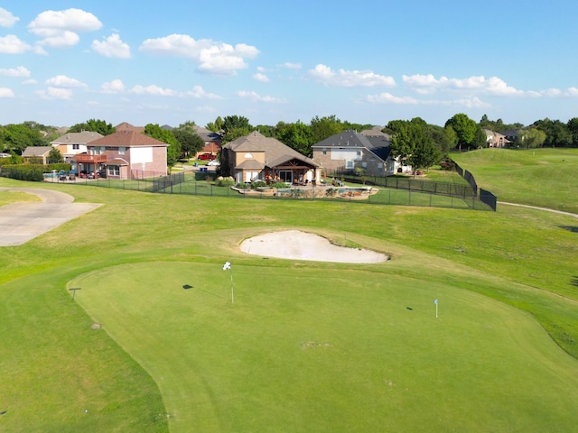 view of community featuring a lawn