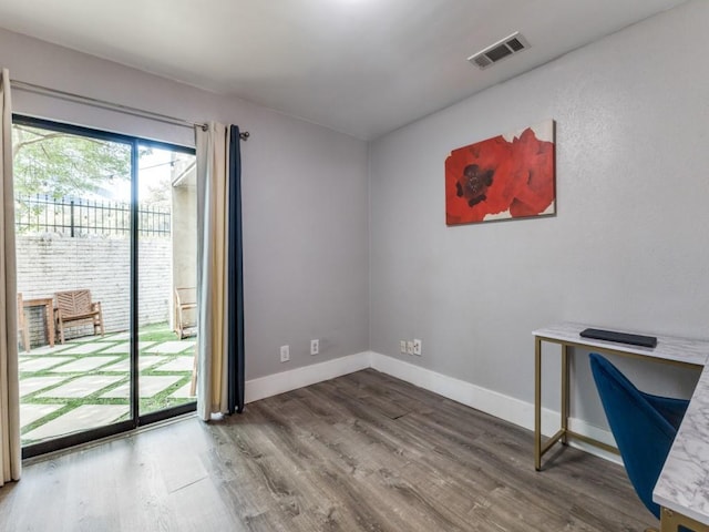 home office featuring hardwood / wood-style floors