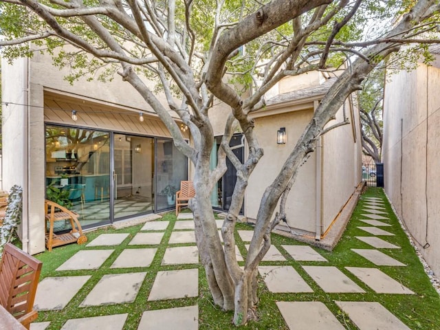 rear view of house featuring a patio area