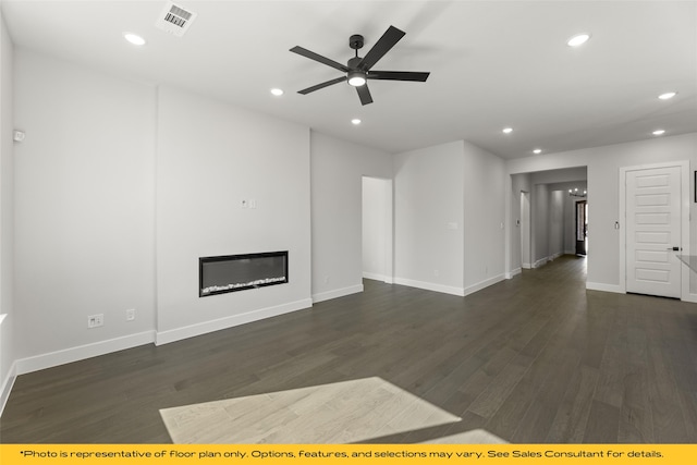 unfurnished living room with ceiling fan and dark hardwood / wood-style flooring