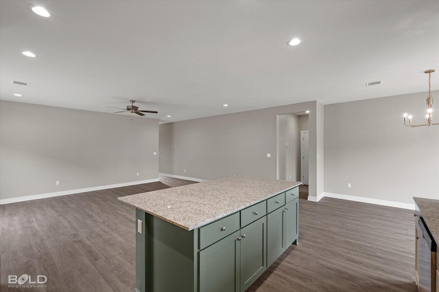 kitchen featuring dark wood finished floors, recessed lighting, green cabinets, baseboards, and ceiling fan with notable chandelier