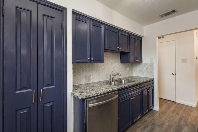 kitchen featuring dark hardwood / wood-style flooring, sink, backsplash, blue cabinetry, and stainless steel dishwasher