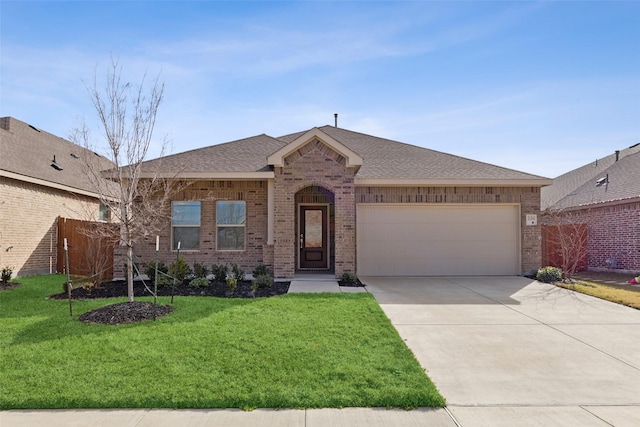 ranch-style home with a front lawn and a garage