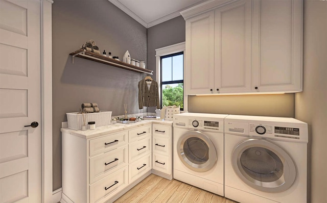 clothes washing area with light hardwood / wood-style floors, ornamental molding, cabinets, and washing machine and clothes dryer