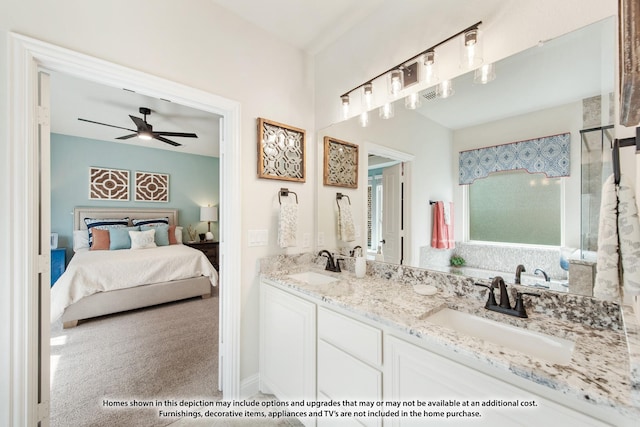 bathroom featuring ceiling fan and vanity