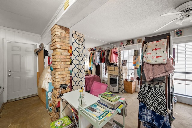 storage room with ceiling fan