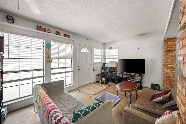 living room featuring a textured ceiling