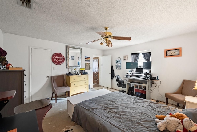 bedroom featuring a textured ceiling and ceiling fan