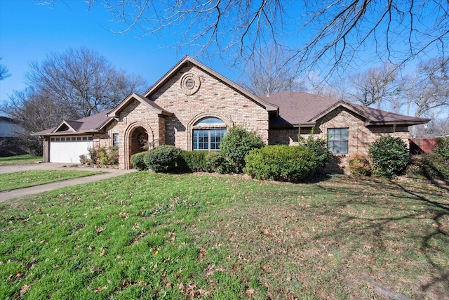 ranch-style home with a garage and a front yard