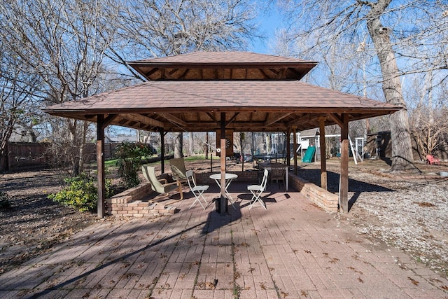 surrounding community with a gazebo and a patio area